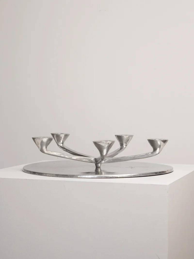 Rotating Five Arm Star Candleholder in Sand Cast Aluminium