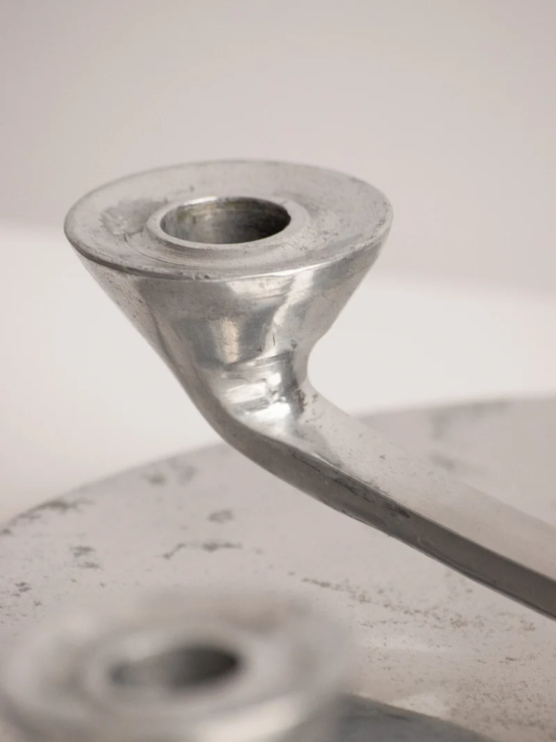 Rotating Five Arm Star Candleholder in Sand Cast Aluminium