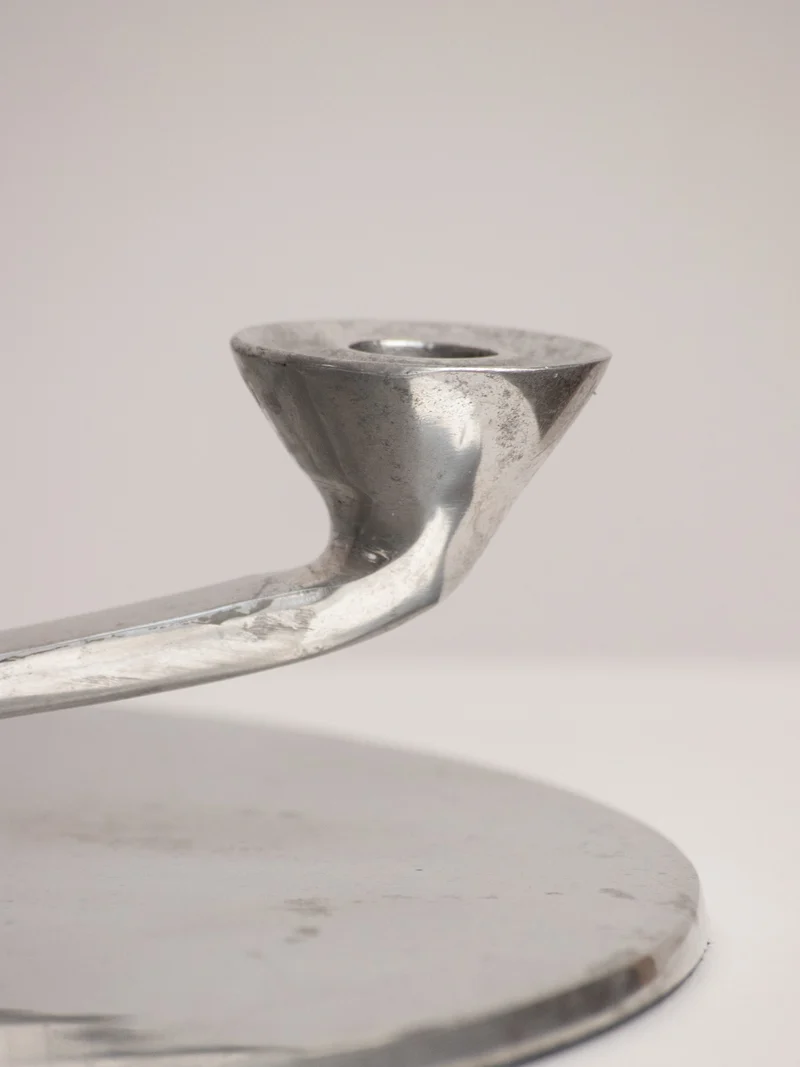 Rotating Five Arm Star Candleholder in Sand Cast Aluminium