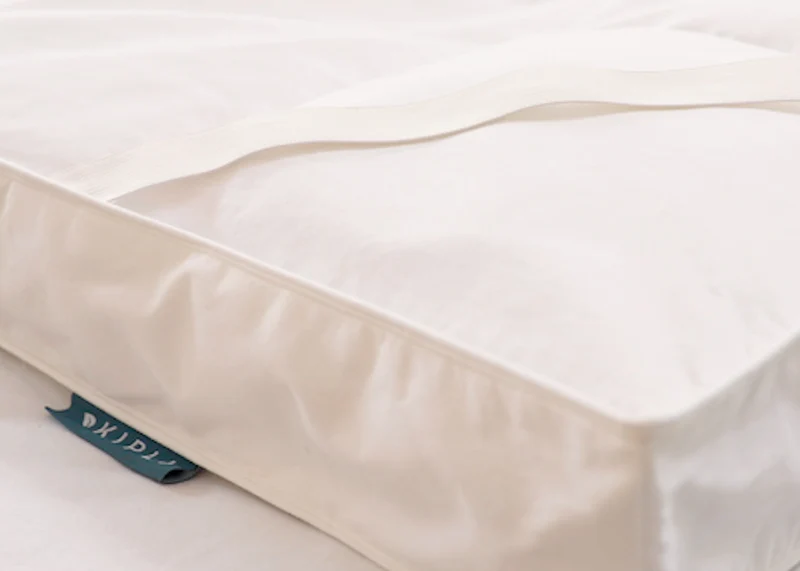 Surmatelas en plumes et duvet