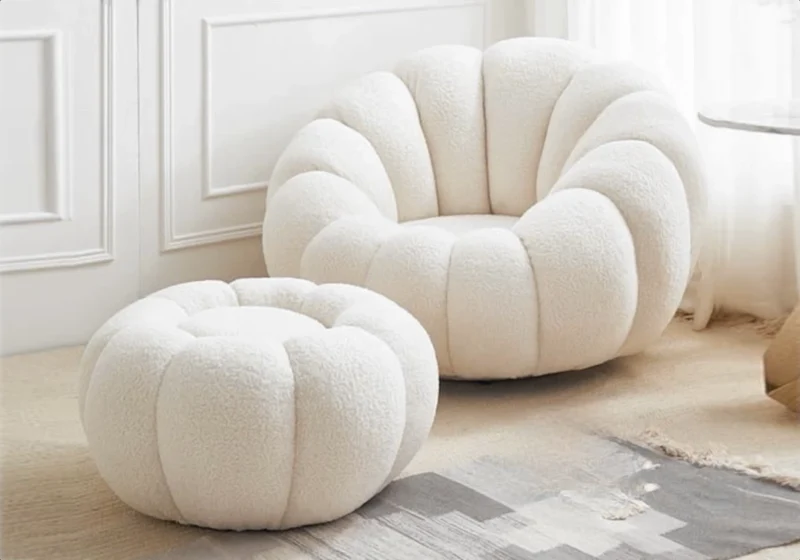 Fauteuil pivotant avec pouf en laine bouclée - Cozy