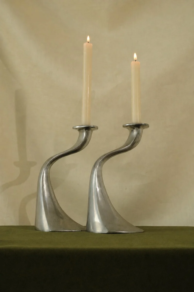 A Sculptural Set of 2 Inox Candle Holders