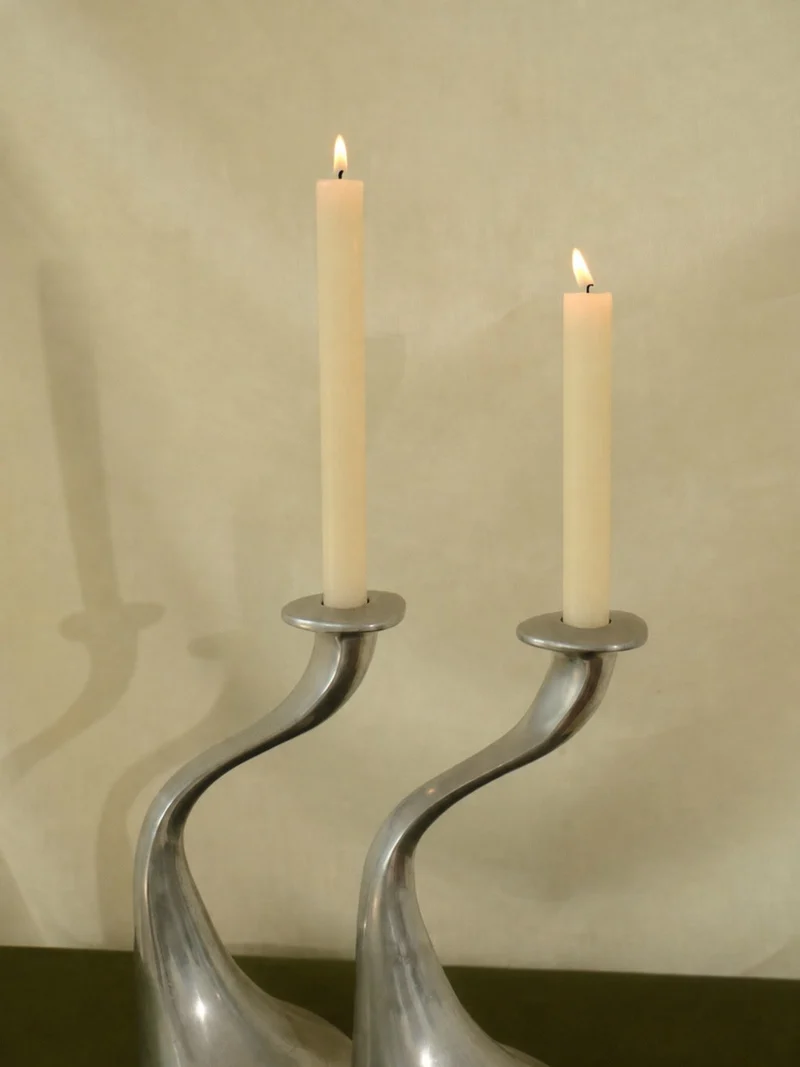 A Sculptural Set of 2 Inox Candle Holders