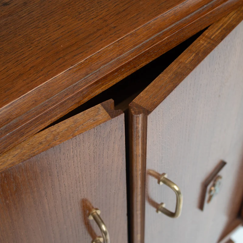 Mid-Century Oak Cabinet with Brass Handles and Decorative Inlays