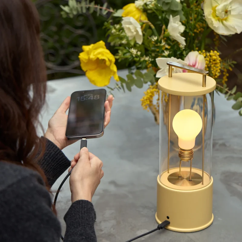 The Muse 2.0 Portable Lamp in Posset Yellow