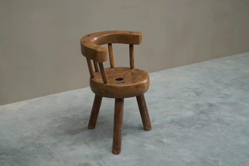 A Sculptural Three-Legged Provincial Vernacular Chair in Heavy Solid Oak France Early 20th Century