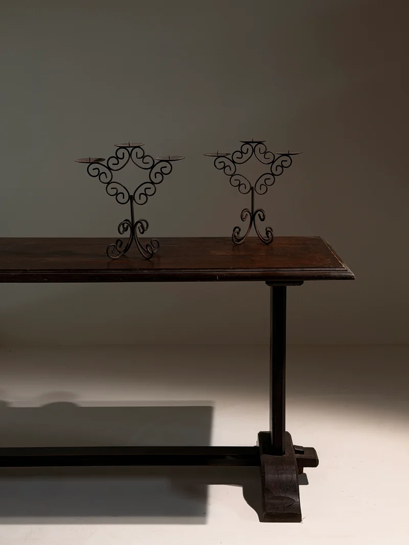 Pair of three-light wrought-iron candleholders, circa 1950