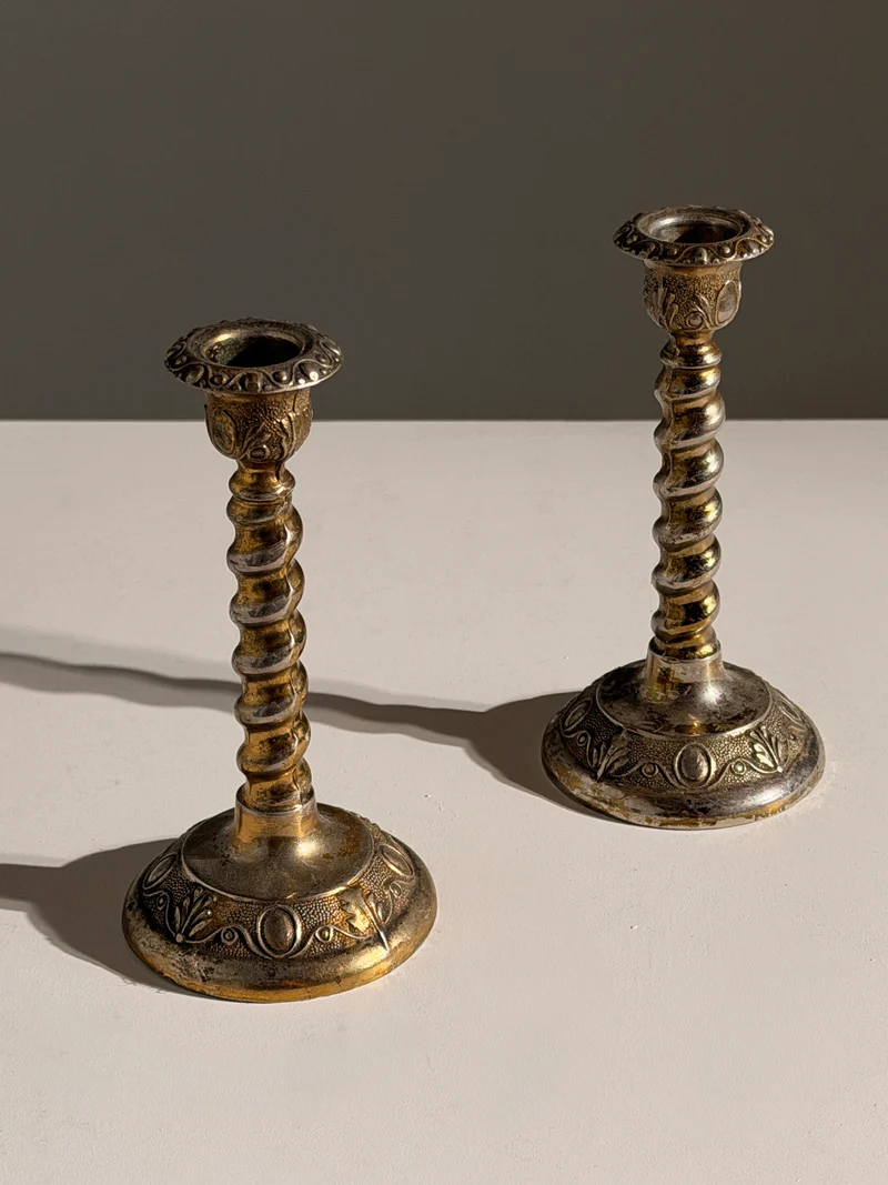 Pair of silver-plated candle holders, England