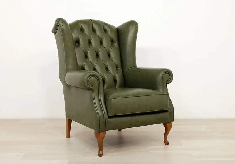 Fauteuil bergère vintage en cuir vert - Chesterfield