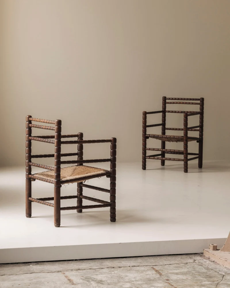 Sculptural French 'Bobbin' armchairs, 1950s