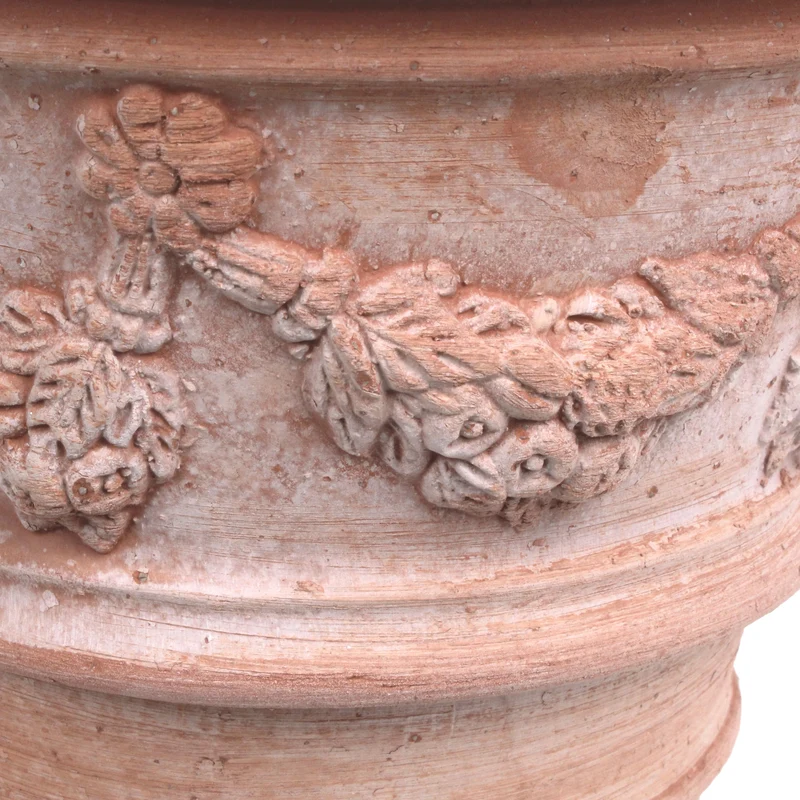 Petit pot de fleurs en terre cuite