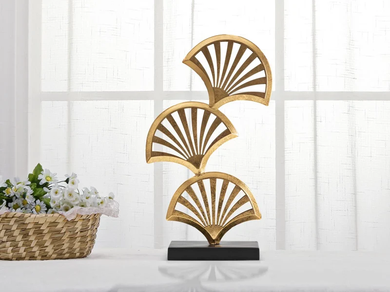 Sculpture décorative triple feuille de palmier dorée