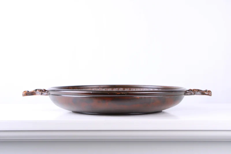 Plateau romain avec un relief de Méduse (noir) - céramique sigillée