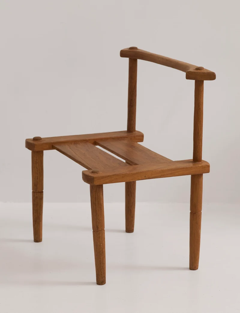 Large one-of-a-kind Baoulé chair in solid wood