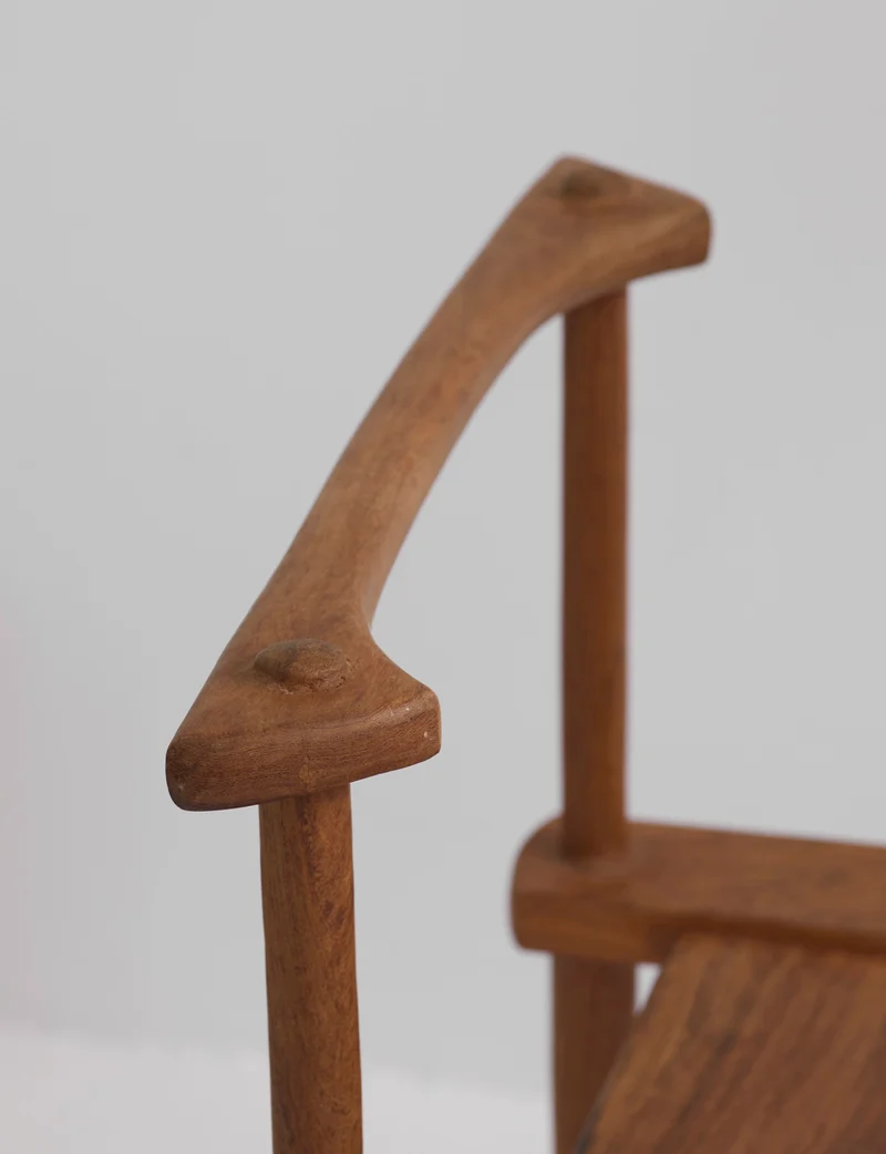 Large one-of-a-kind Baoulé chair in solid wood