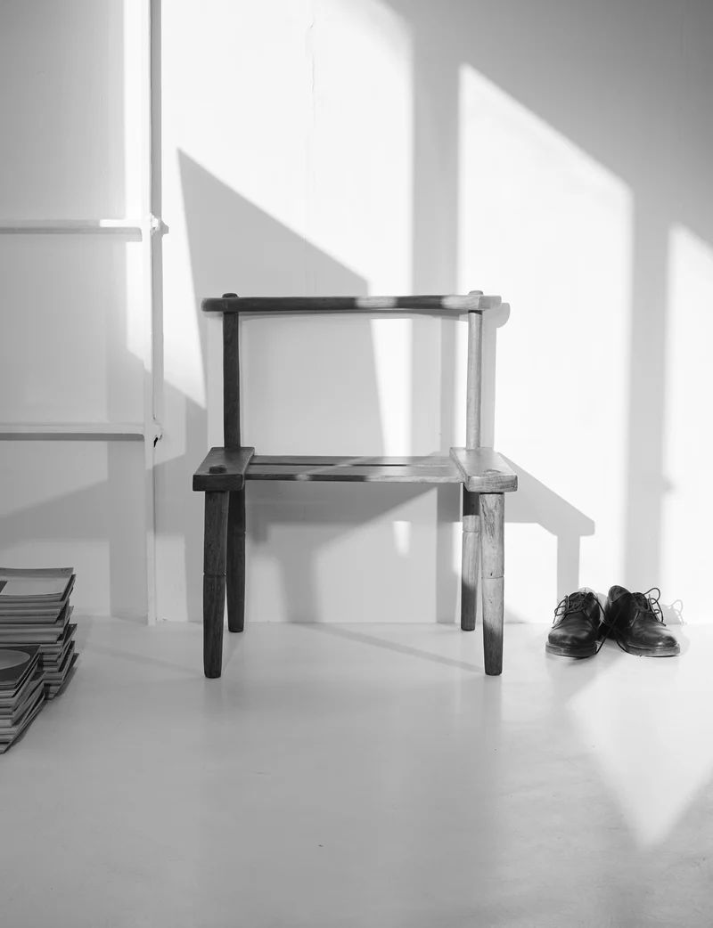 Large one-of-a-kind Baoulé chair in solid wood