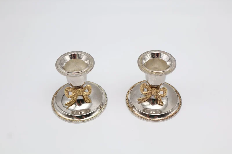 Pair of Vintage Silver-Plated Candlesticks with Gilt Bow Accents