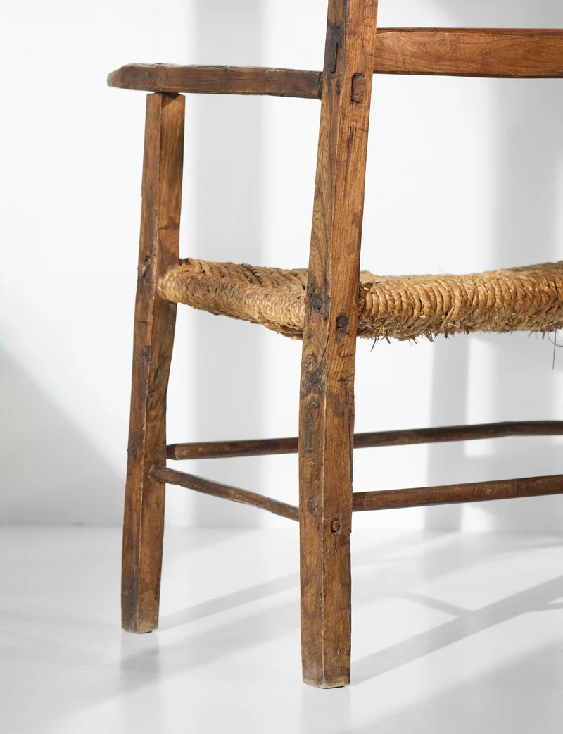 A French folk bench from the 19th Century. Wood and straw