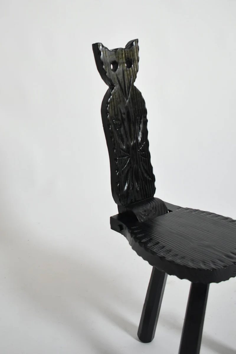 Pair of brutalist ebonised wood owl chairs, 1960s