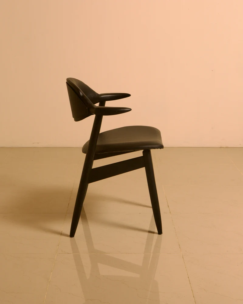 Dutch "Buffalo" armchair in wood and black leather, 1960s