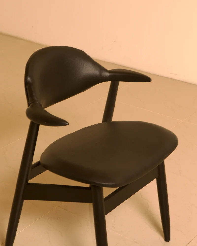 Dutch "Buffalo" armchair in wood and black leather, 1960s