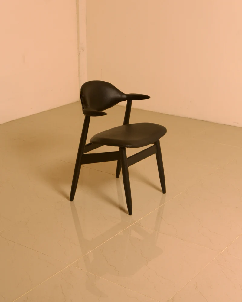 Dutch "Buffalo" armchair in wood and black leather, 1960s