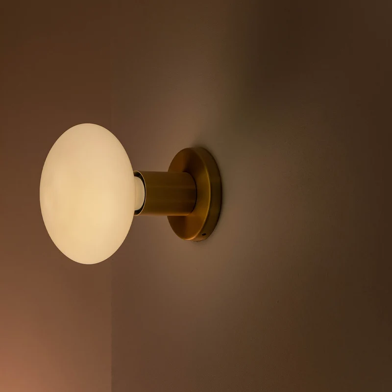 Lochan Wall Light in Brass + Oval Dim to Warm