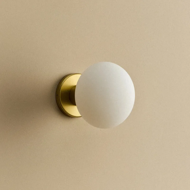 Lochan Wall Light in Brass + Oval Dim to Warm