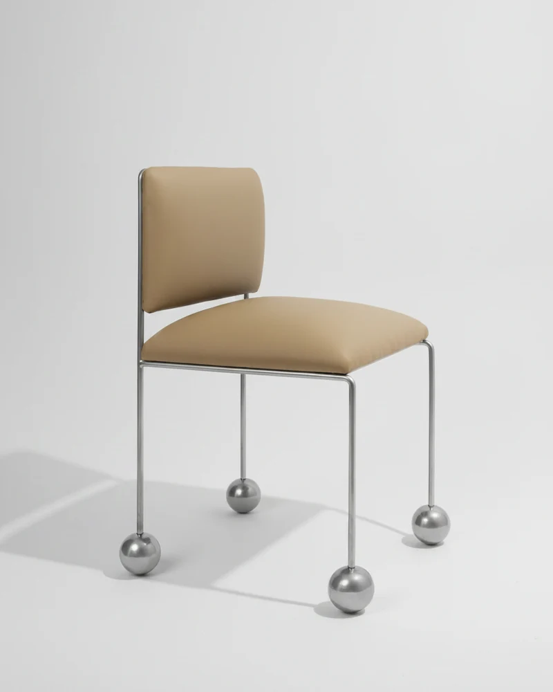Ball Foot Sculptural Chair in Vegan Leather