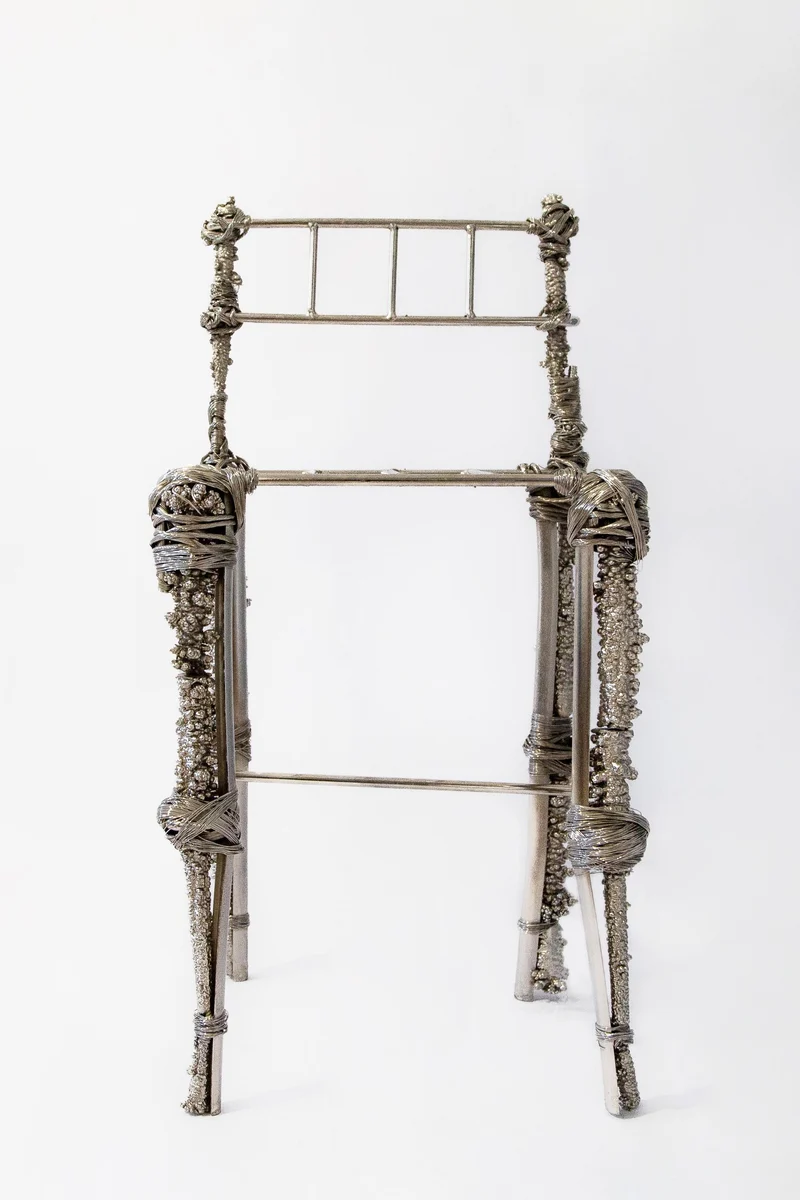 Fisherman Chair, Sculptural Chair in recycled nickel, chrome, copper, steel
