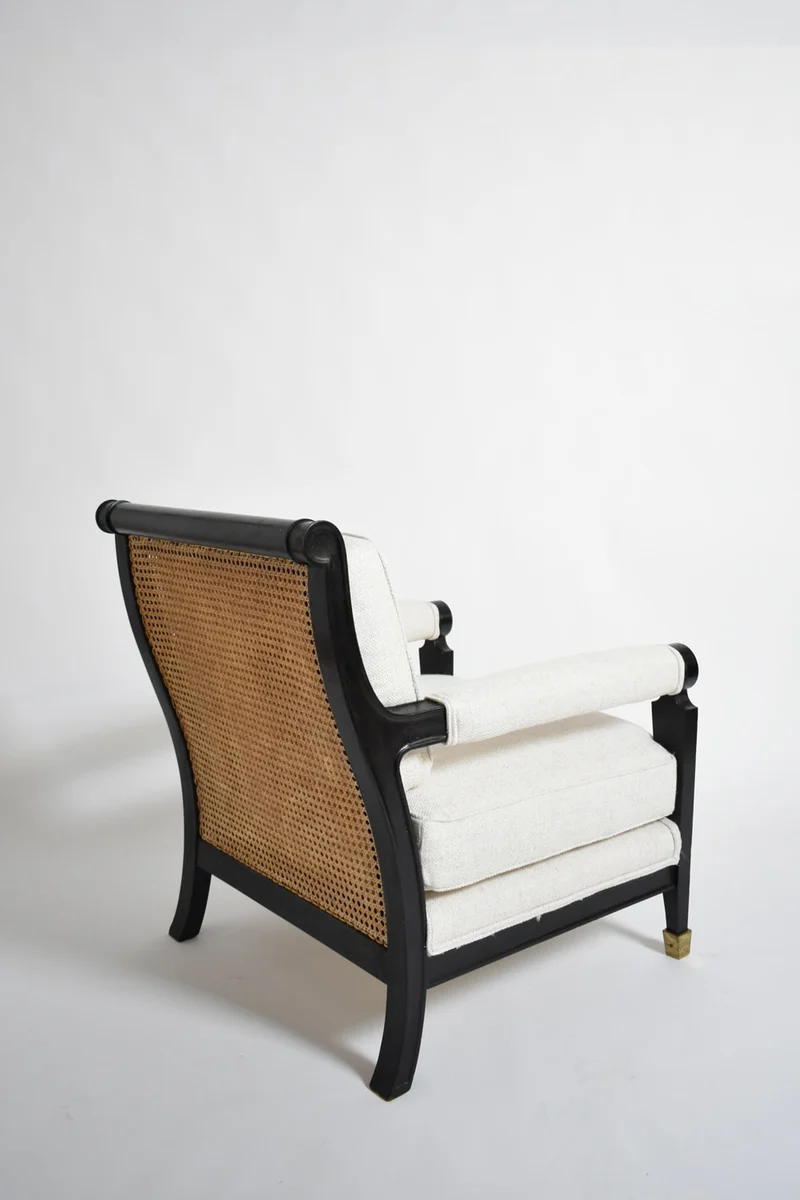 Pair of neoclassical ebonised wood and caning armchairs, 1960s