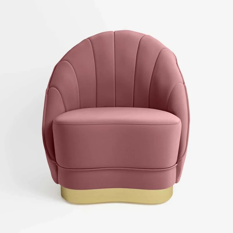 Fauteuil en velours rose vintage, base cerclage dor effet laiton